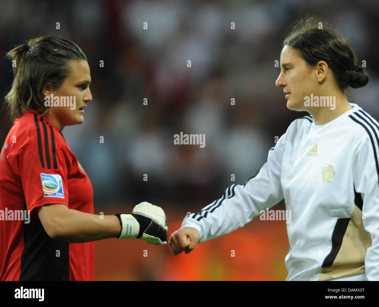 Germany's goalkeeper Nadine Angerer (L) and Birgit Prinz after the Group A match Germany against Nigeria of FIFA Women's World Cup soccer tournament at the FIFA Women's World Cup Stadium in Frankfurt, Germany, 30 June 2011. Foto: Arne Dedert dpa/lhe  +++(c) dpa - Bildfunk+++ Stock Photo