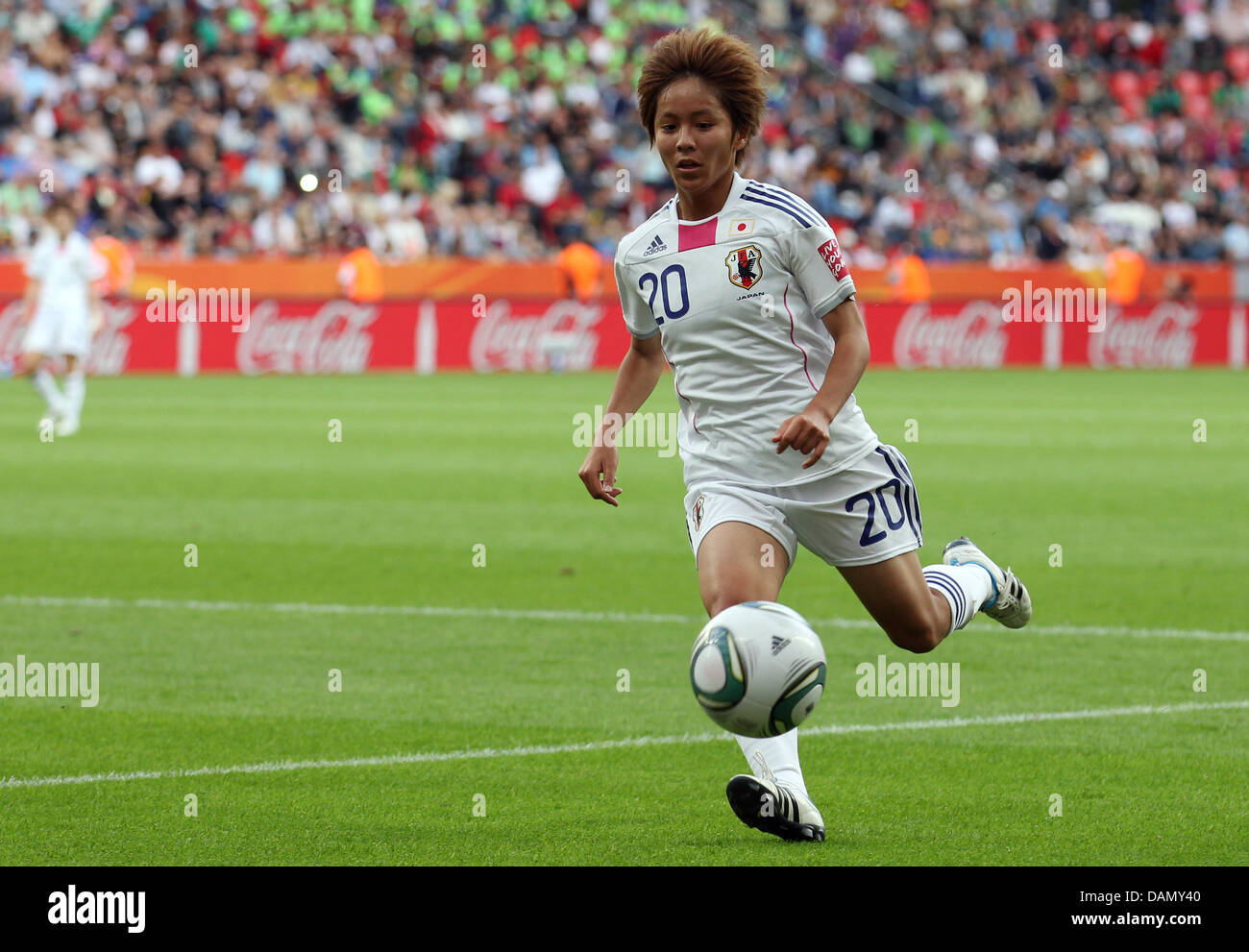 Mana Iwabuchi of Japan controls the ball during the Group B match Japan against Mexico of FIFA Women's World Cup soccer tournament at the FIFA Women's World Cup Stadium in Leverkusen Germany, 01 July 2011. Foto: Friso Gentsch dpa/lnw Stock Photo