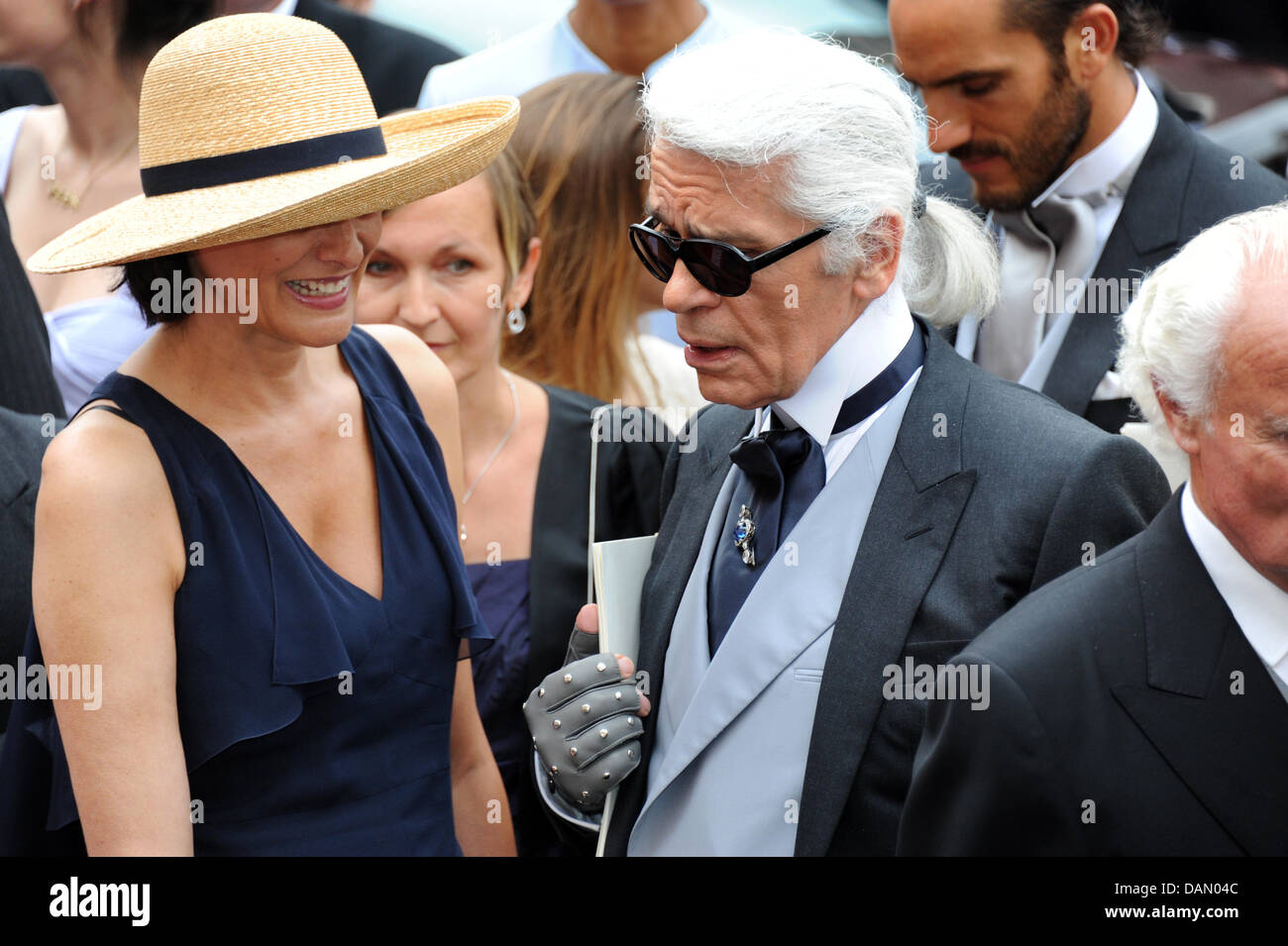 Fashion designer Karl Lagerfeld and model Ines de la Fressange arrive for  the religious wedding of Prince Albert II and Princess Charlene in the  Prince's Palace in Monaco, 02 July 2011. Some
