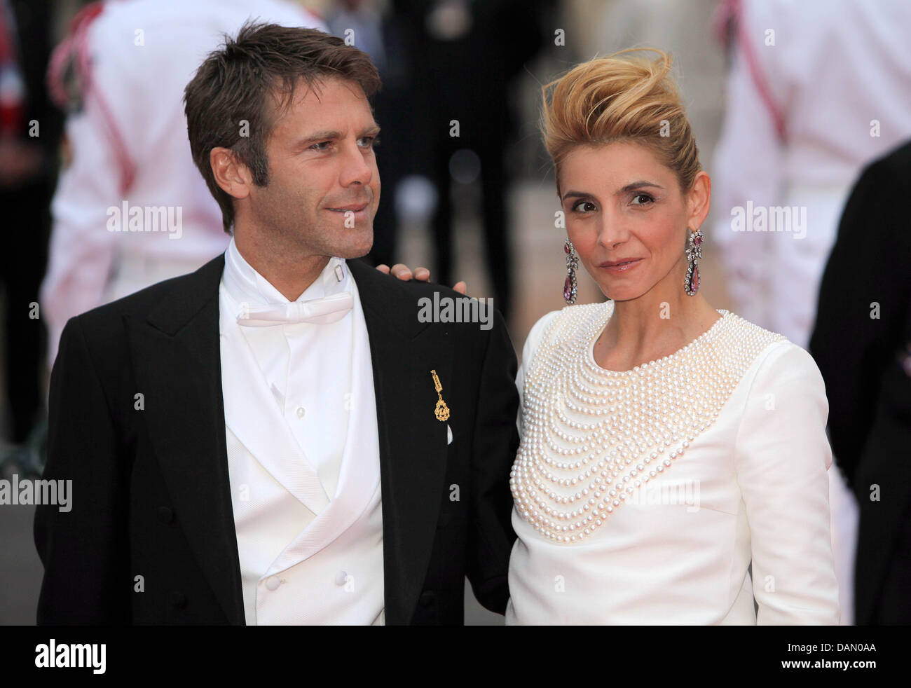 Prince Emanuele Filiberto of Venice and Piedmont and French actress Clotilde Courau, Princess of Venice and Piedmont,  attend the official dinner on the Opera terraces after the religious wedding of Prince Albert II and Princess Charlene of Monaco in Monaco, 02 July 2011. 450 guests have been invited for the dinner followed by a ball in the Opera. Photo: Albert Nieboer Stock Photo