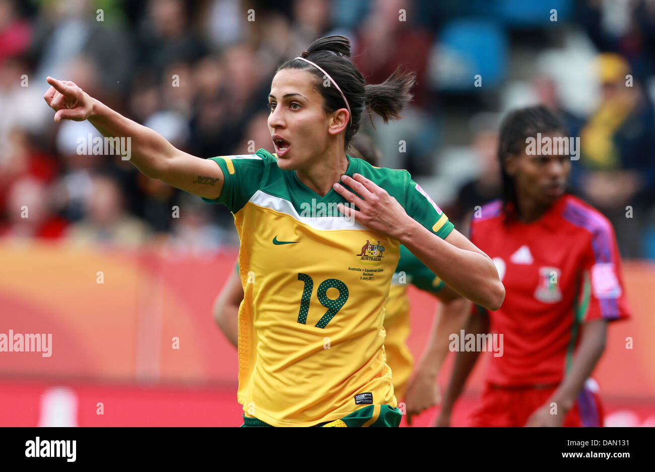 Leena Khamis of Australia celebrates her 10 during the Group D match