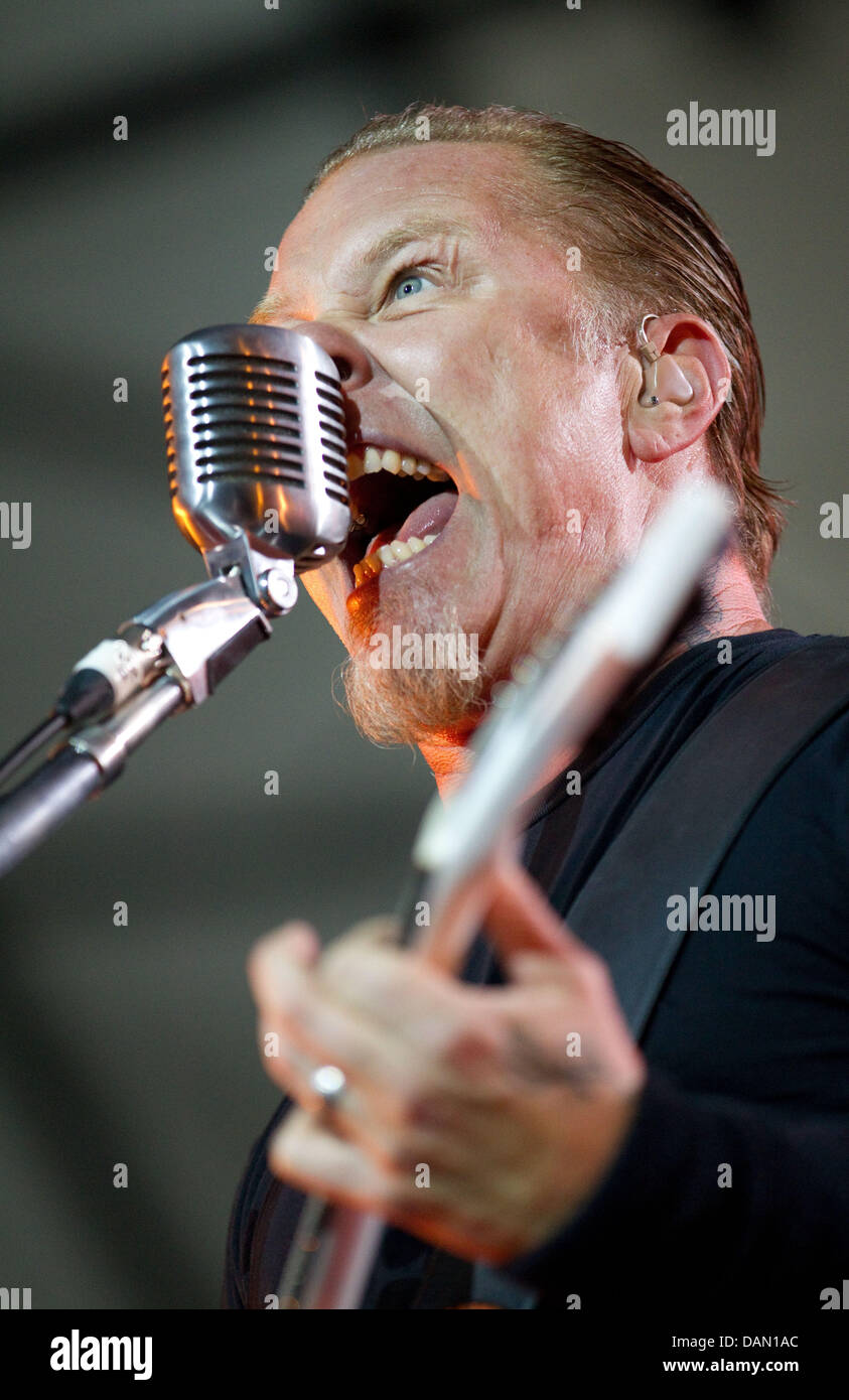 James Hetfield, singer and guitar player of US band Metallica, performs at the The Big Four festival tour at the Arena in Gelsenkirchen, Germany, 02 July 2011. Photo: Friso Gentsch Stock Photo