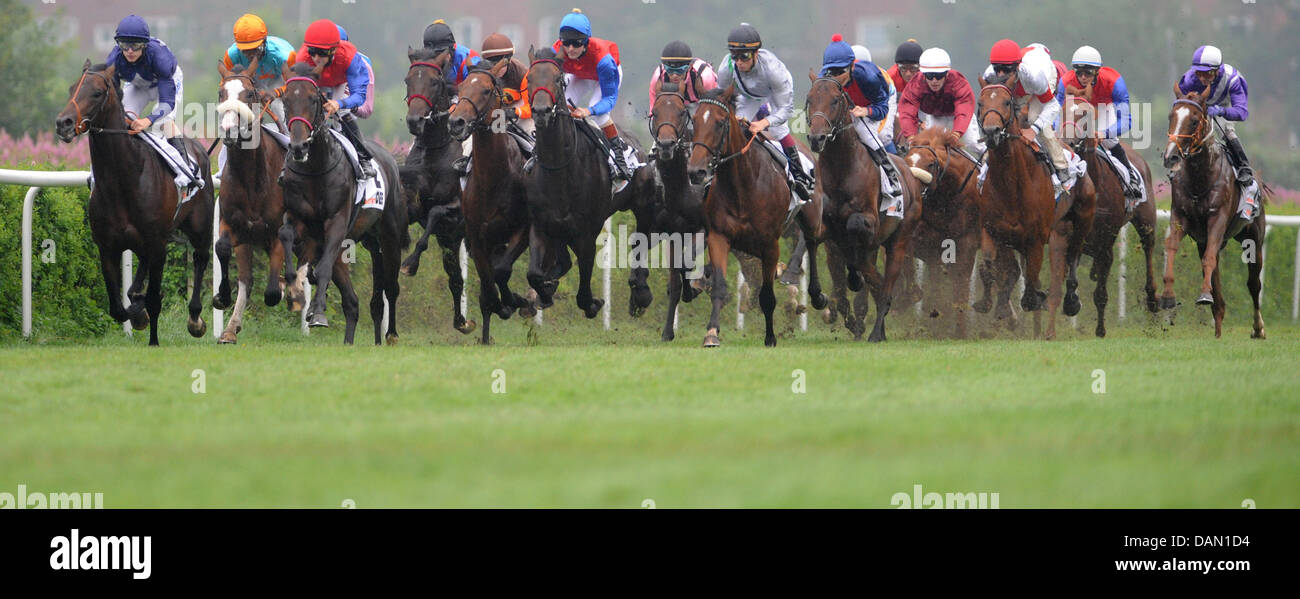 The riders compete in 142nd Deutsches Derby in Hamburg, Germany, 03 ...