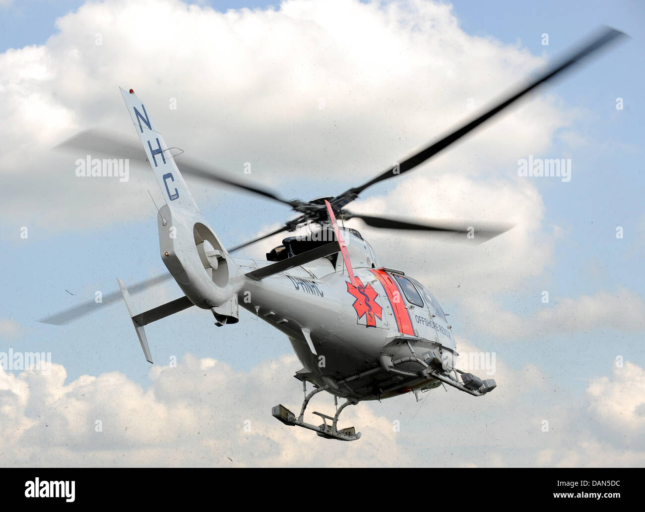 A helicopter of the model Eurocopter SA 365, that is specially equipped for offshore rescue missions, takes off for a demonstration flight in Emden, Germany, 08 July 2011. The helicopter is the core element of offshore rescue planning, which is conceptualised by wind turbine manufacturer BARD in collaboration with the German Red Cross and the company Northern HeliCopter. Photo: Ing Stock Photo