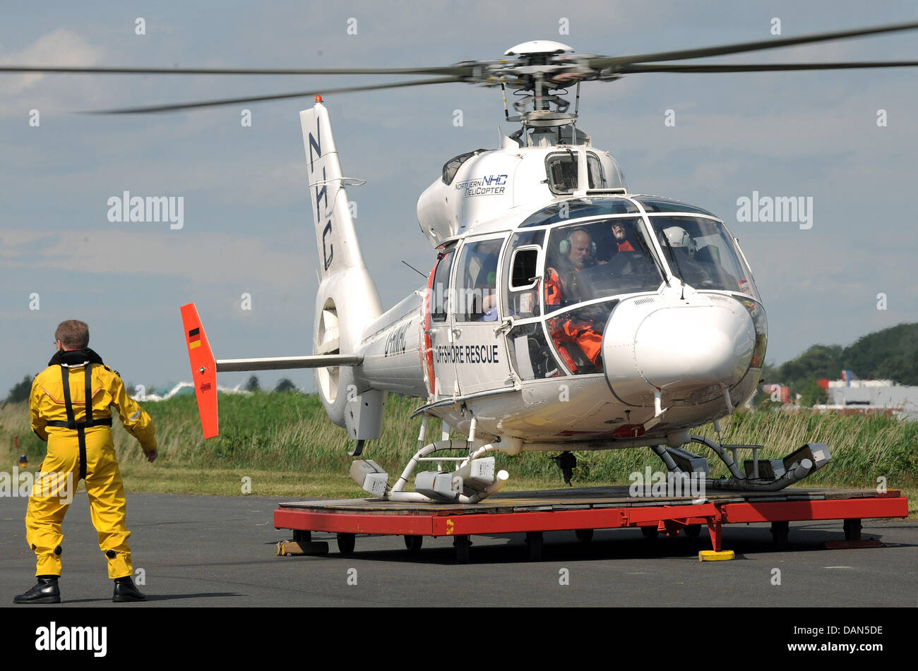 A helicopter of the model Eurocopter SA 365, that is specially equipped for offshore rescue missions, takes off for a demonstration flight in Emden, Germany, 08 July 2011. The helicopter is the core element of offshore rescue planning, which is conceptualised by wind turbine manufacturer BARD in collaboration with the German Red Cross and the company Northern HeliCopter. Photo: Ing Stock Photo