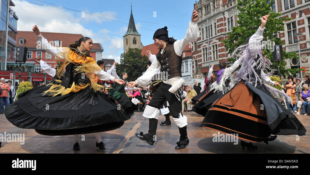 The group 'Nosa Terra' from Pereiras (Spain) performs a Spanish folk dance at the folklore festival 'Danetzare' in Erfurt, Germany, 08 July 2011. Till 10 July 2011, 20 German and international dance groups will perform at the festival. Photo: Martin Schutt Stock Photo