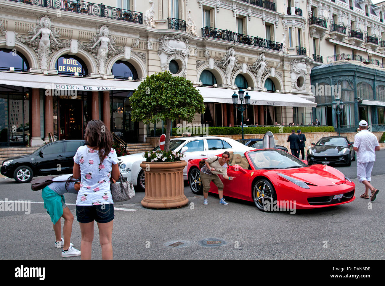 Hotel de Paris - Le Louis XV opposite of Grand Casino Monte Carlo Principality of Monaco Luxury cars  Bentlee Mercedes Ferrari Stock Photo