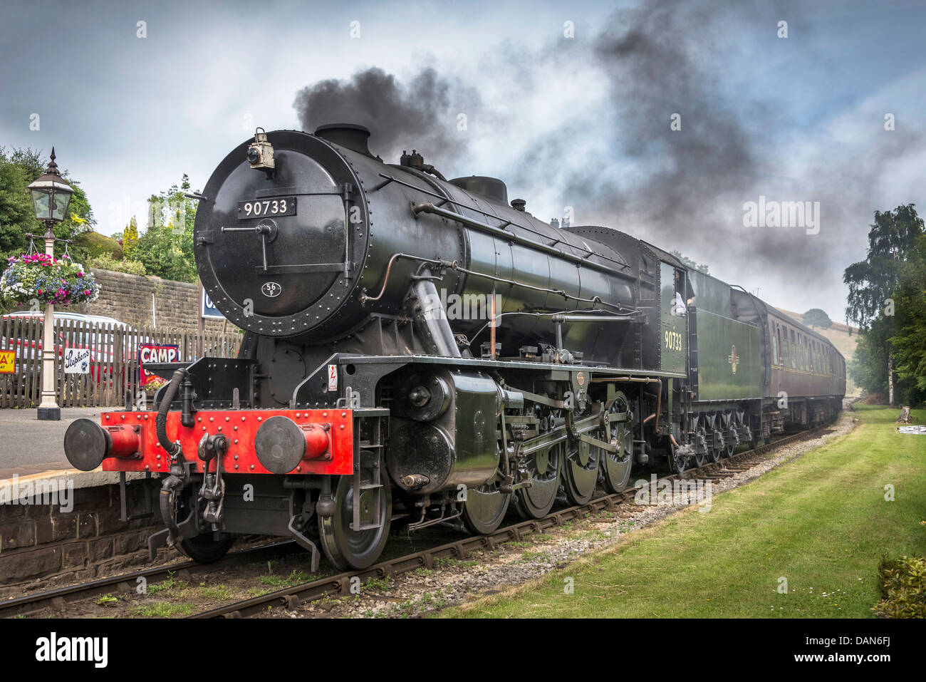 WD Class 2-8-0 (8F) steam loco No. 90733 at Oakworth station the scene of the film the Railway Children. Stock Photo