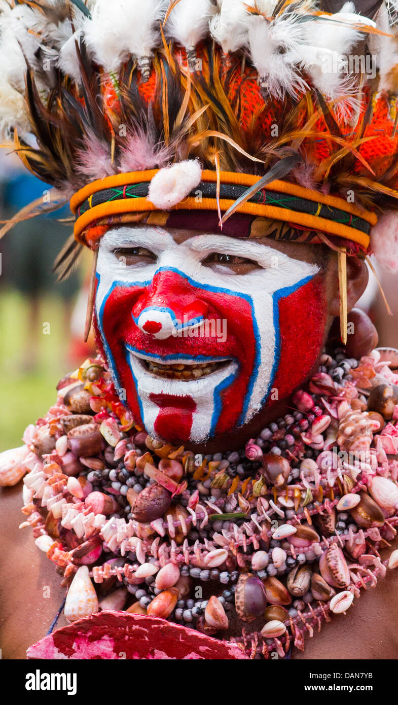 Man with his face painted and wearing shells, Goroka Show, Papua New Guinea Stock Photo