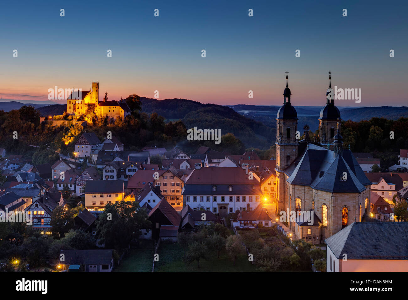Germany, Bavaria, View of Goessweinstein Basilica and Castle at night Stock Photo