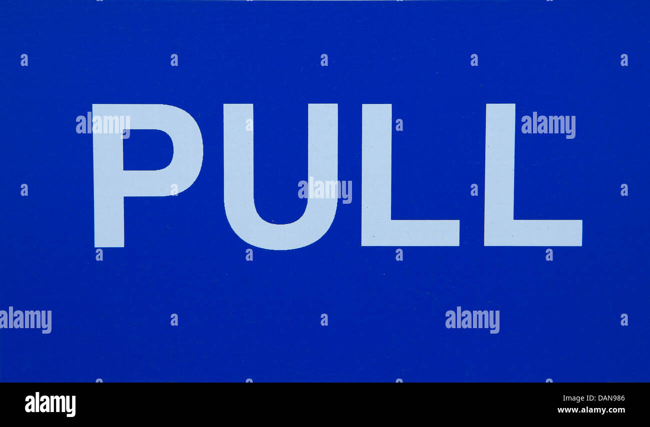 The word Pull on a blue background Stock Photo