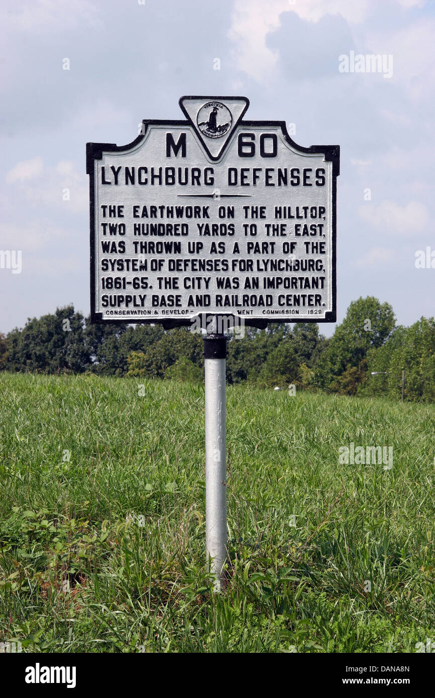 LYNCHBURG DEFENSES The earthwork on the hilltop, two hundred yards to the east, was thrown up as a part of the system of defenses for Lynchburg, 1861-65. The city was an important supply base and railroad center. Conservation & Development Commission, 1929 Stock Photo