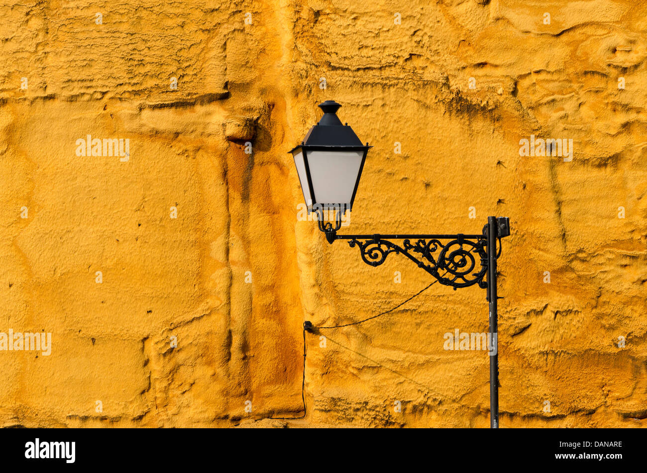 streetlight on yellow background Stock Photo