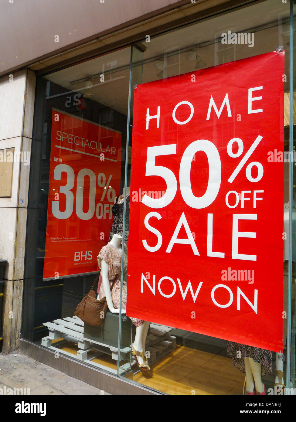 50% off sale sign in a clothes shop 