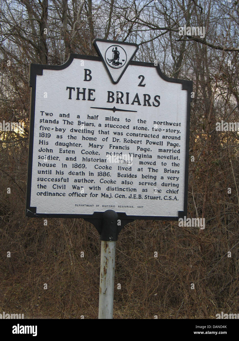 THE BRIARS Two and a half miles to the northwest stands The Briars, a stuccoed stone, two-story, five-bay dwelling that was constructed around 1819 as the home of Dr. Robert Powell Page. His daughter, Mary Francis Page, married John Esten Cooke, noted Virginia novelist, soldier, and historian. They moved to the house in 1869. Cooke lived at The Briars until his death in 1886. Besides being a very successful author, Cooke also served during the Civil War with distinction as the chief ordinance officer for Maj. Gen. J.E.B. Stuart, C.S.A. Department of Historic Resources, 1997 Stock Photo