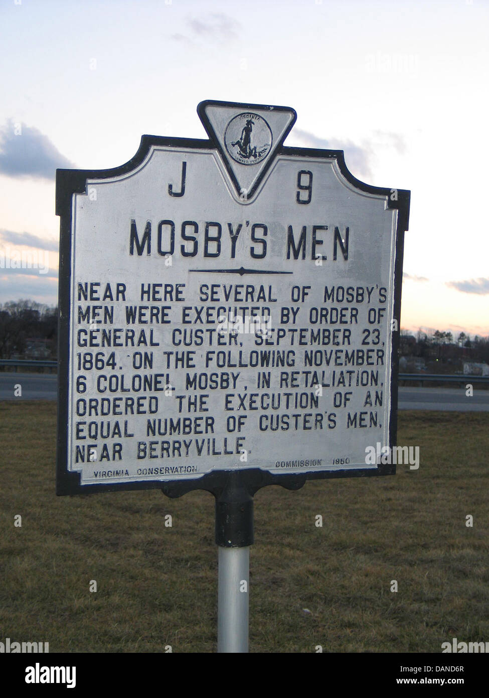 MOSBY'S MEN Near here several of Mosby's men were executed by order of General Custer, September 23, 1864. On the following November 6 Colonel Mosby, in retaliation, ordered the execution of an equal number of Custer's Men, near Berryville. Virginia Conservation Commission, 1950 Stock Photo