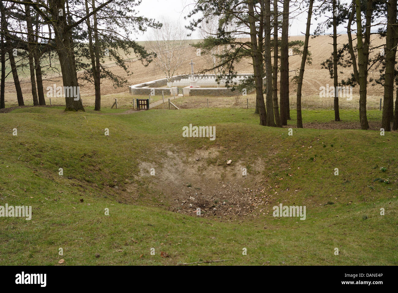 View towards, 'Railway Hollow' British Military Cemetery - in the foreground a shell hole or crater with many others in the area Stock Photo