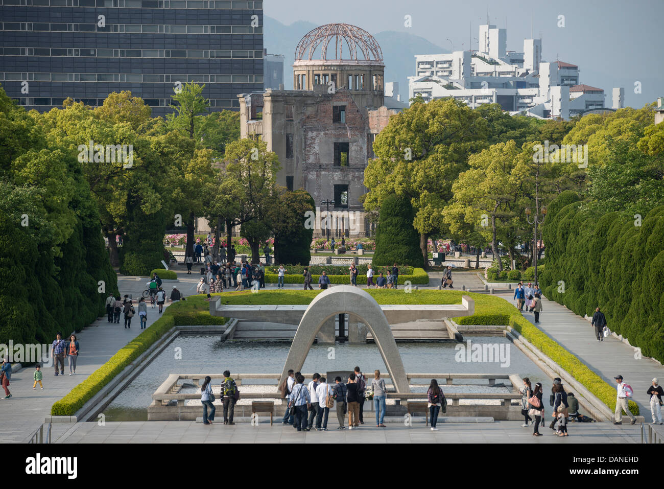 The Cenotaph and A-Bomb Dome in Hiroshima Peace Memorial Park, Japan Stock Photo