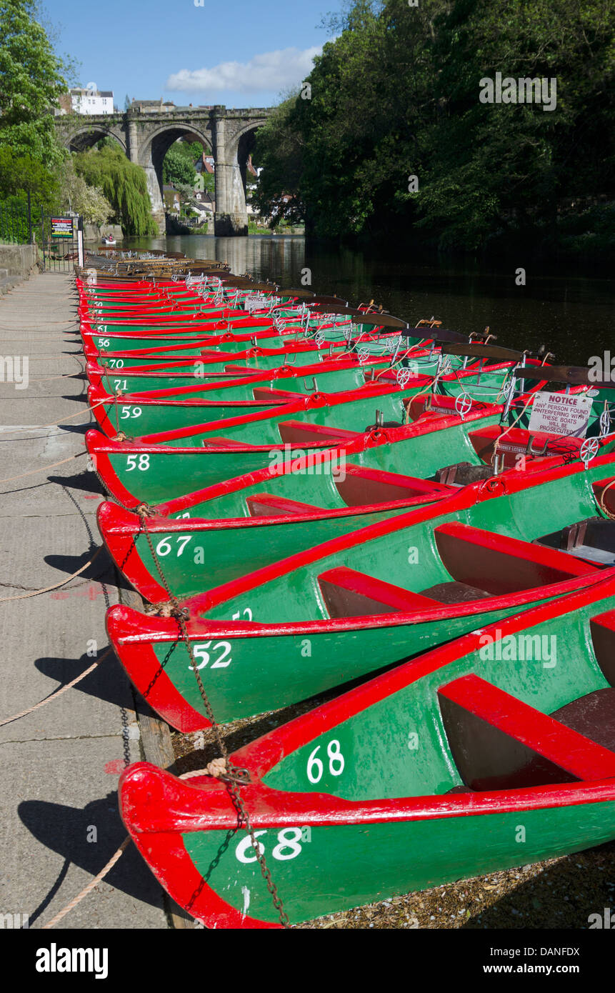 Brightly coloured boats on the River Nid at Knaresborough North Yorkshire Stock Photo