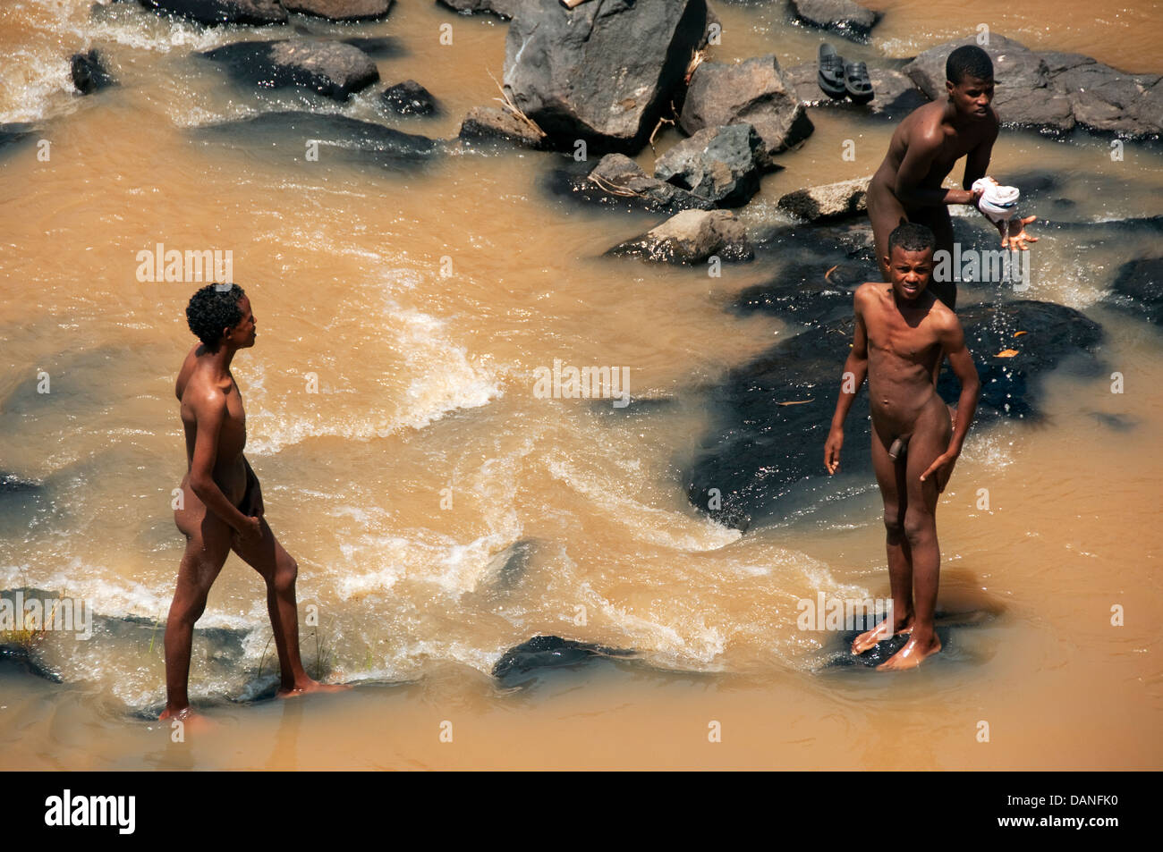 Nude river bath