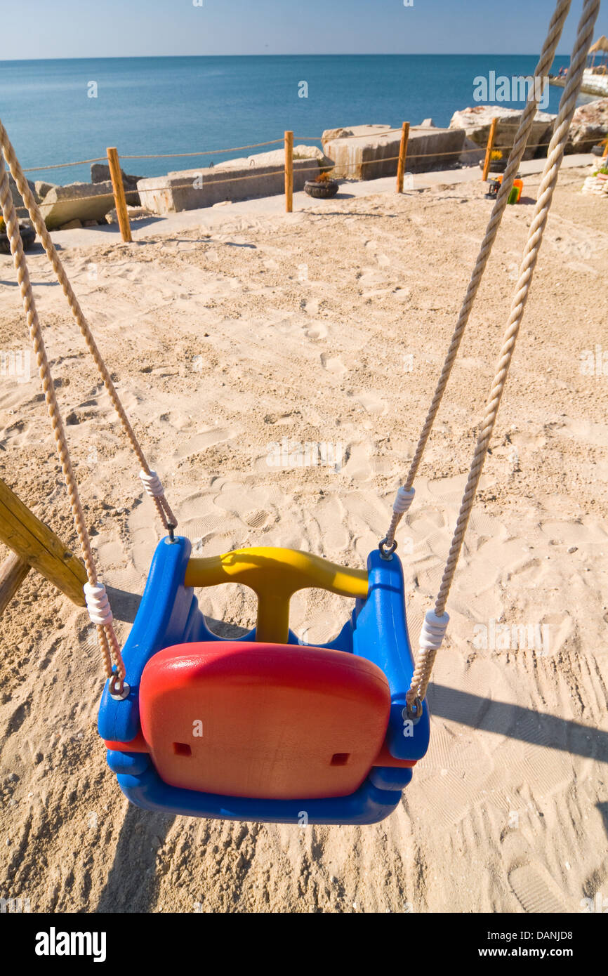 swings on the beach Stock Photo Alamy