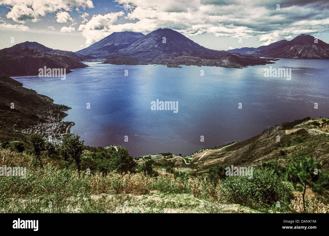 Scenic view of Lake Atitlan, Guatemala, from the Eastern shore showing all three volcanoes, Toliman, Atitlan, and San Pedro. Stock Photo