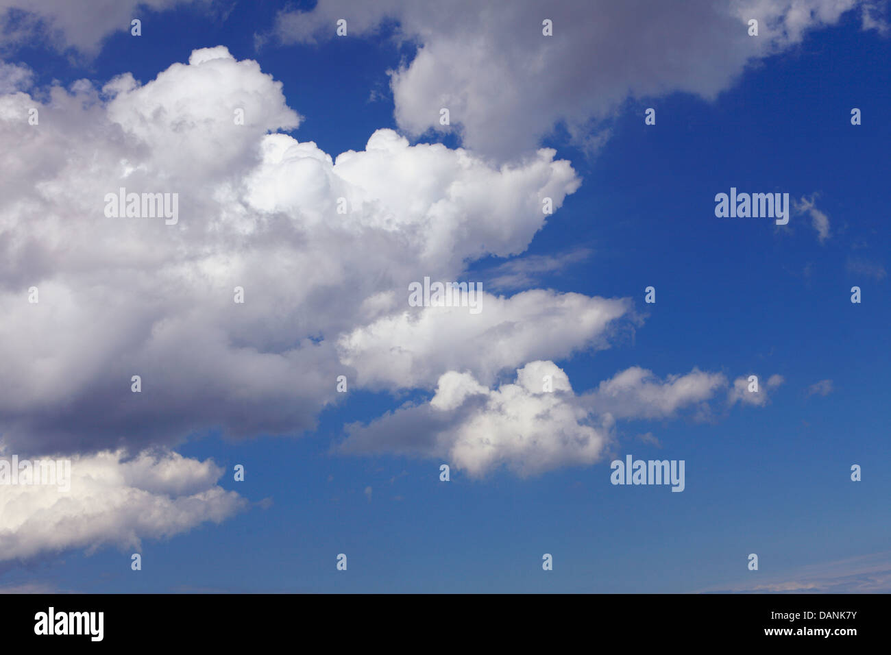 Deep blue sky background with white clouds Stock Photo - Alamy