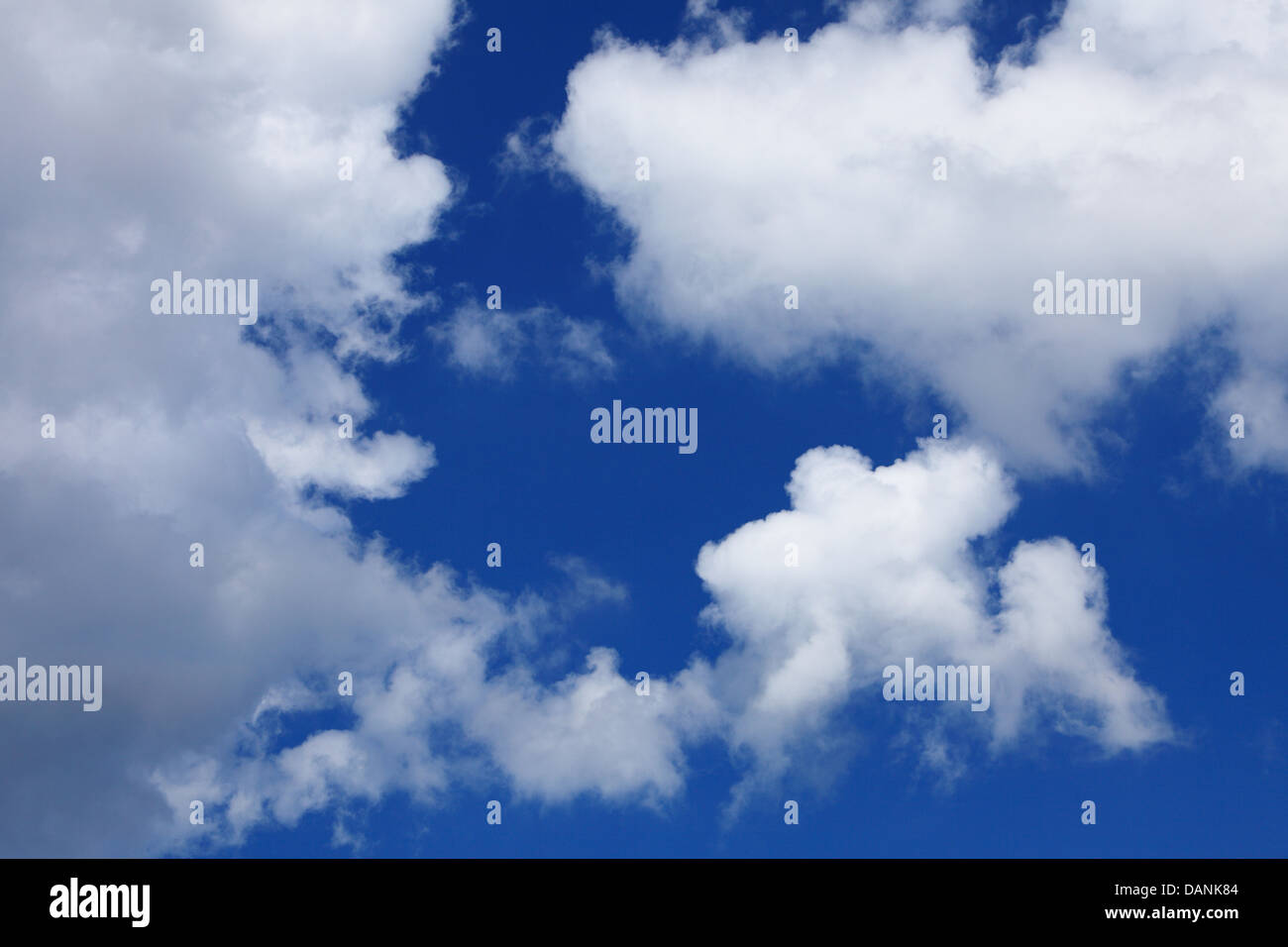 Deep blue sky background with white clouds Stock Photo - Alamy