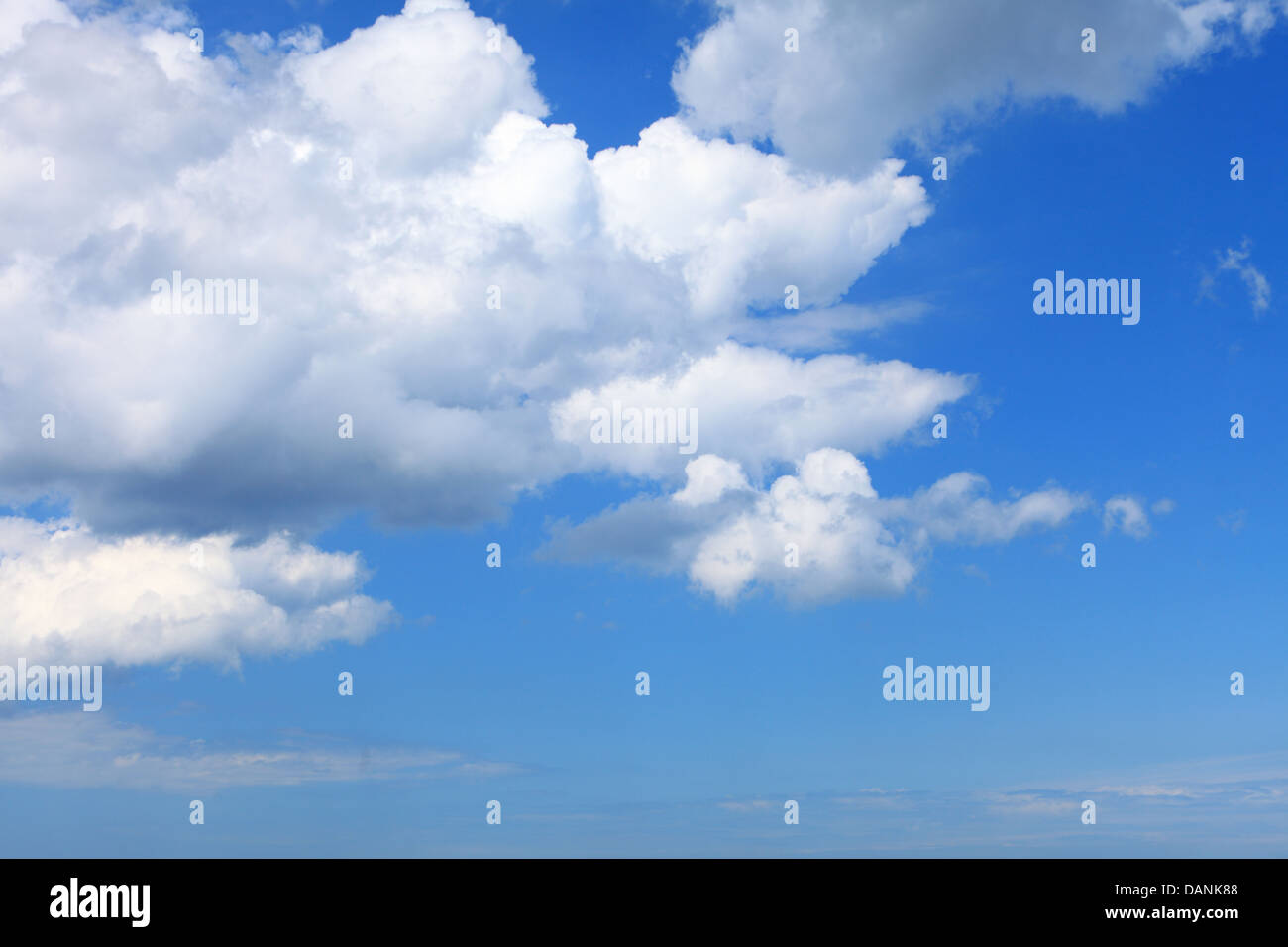 Deep blue sky background with white clouds Stock Photo - Alamy