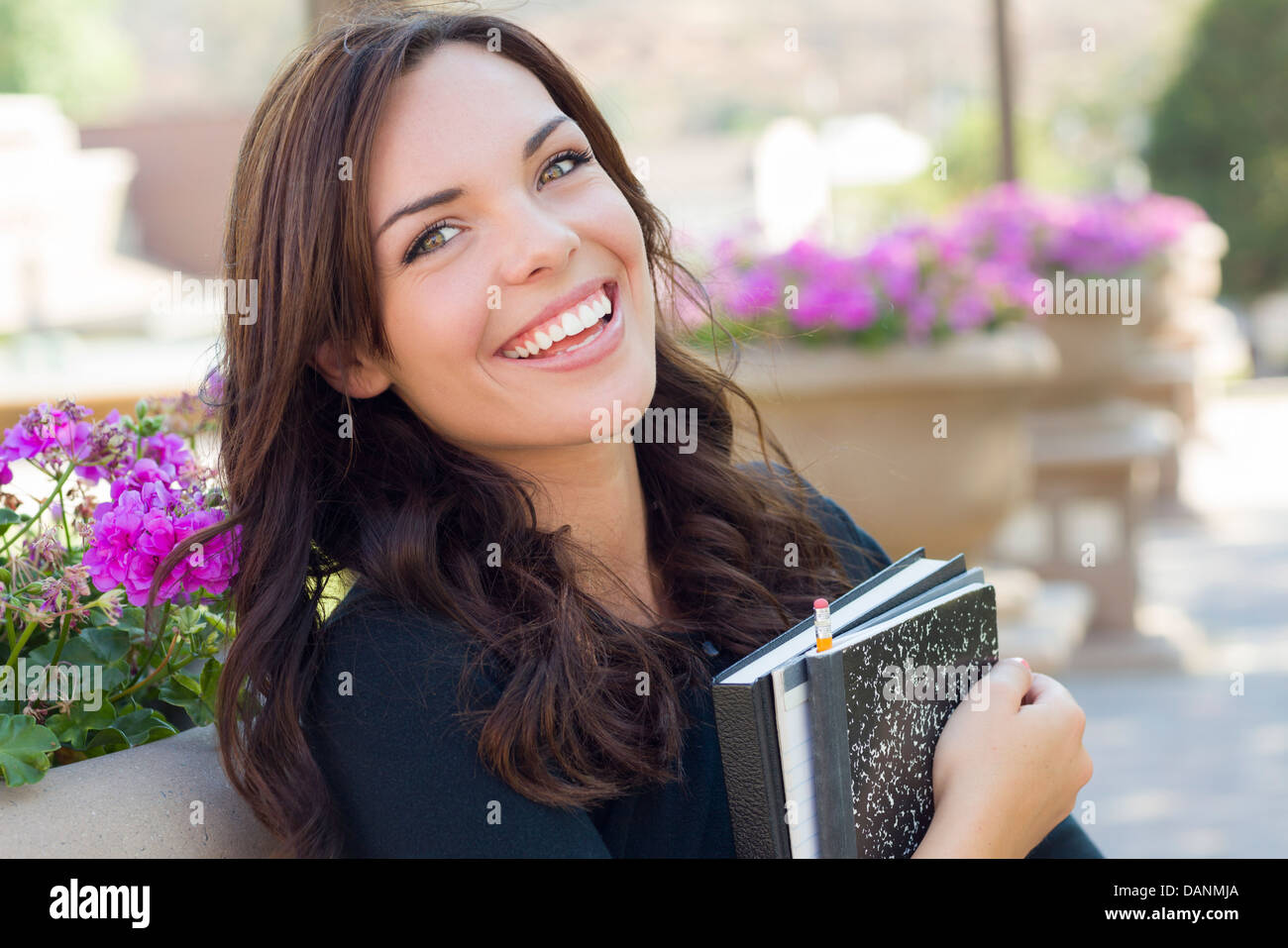 Portrait of Pretty Young Female Student Carrying Books on School Campus ...