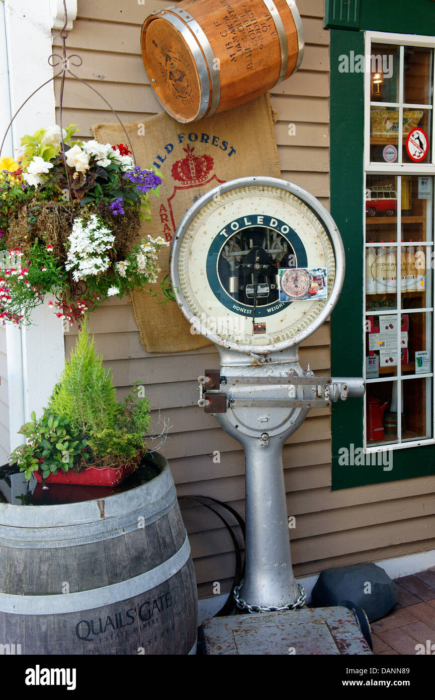 Vintage Toledo weighing scale being used as a decoration outside a