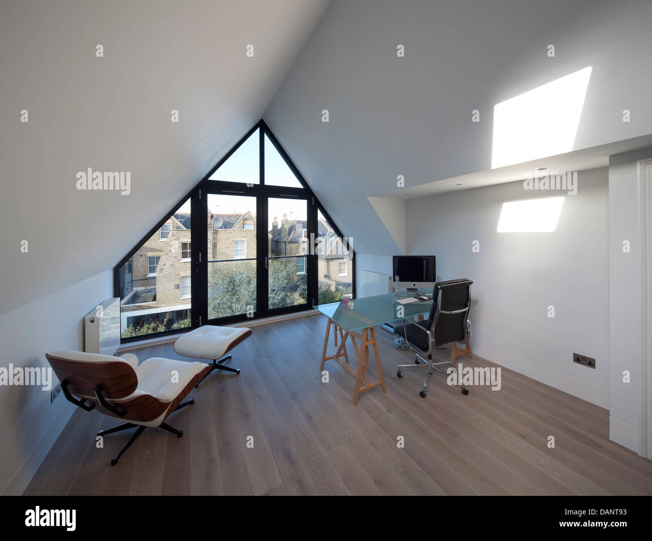 Dents Road, London, United Kingdom. Architect: h2 Architecture, 2012. Office loft conversion with view of neighbouring rooftops. Stock Photo