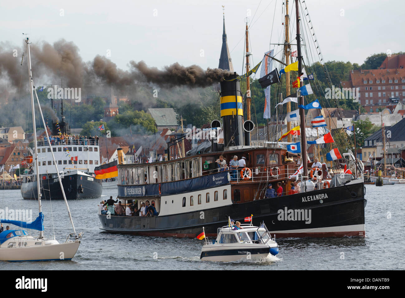 The salon steamship 'Alexandra' built in 1908 puts out to sea during the traditional steamship race on the Flensburg Fjord in Flensburg, Germany, 08 July 2011. Along with many other steamships and other steam driven engines, the event 'Dampf Rundum' is the largest steamer spectacle in Europe, according to the event organizers. Photo: Markus Scholz Stock Photo