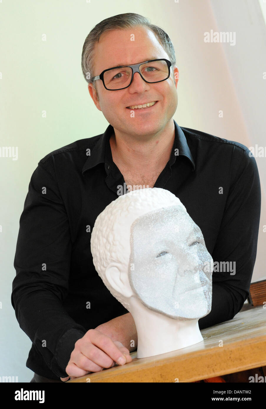 Tim Rucker Germany Jewellery designer Tom Rucker poses with a Nelson Mandela bust made of ...