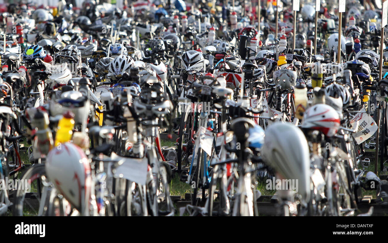 Bikes stand ready for the cycling etappe of the 10th Ironman Challenge in Hipoltstein, Germany, 10 July 2011. For the ironman, the participants have to swim 3,8 km, cycle 180 km and run 42,195 km. Photo: Daniel Karmann Stock Photo