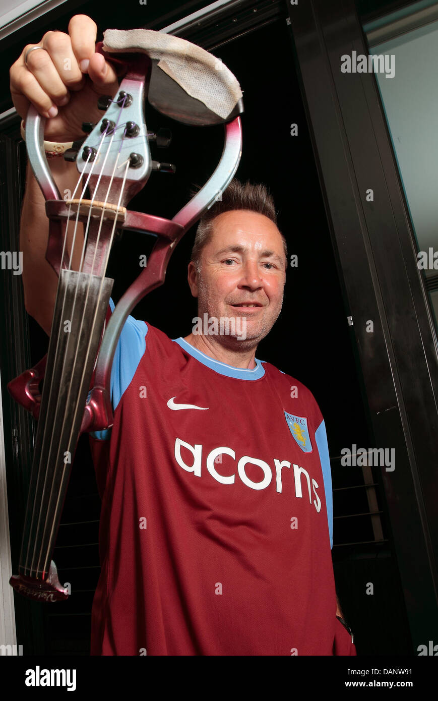 British violin player Nigel Kennedy poses during an open air concert at the Zitadelle Spandau in