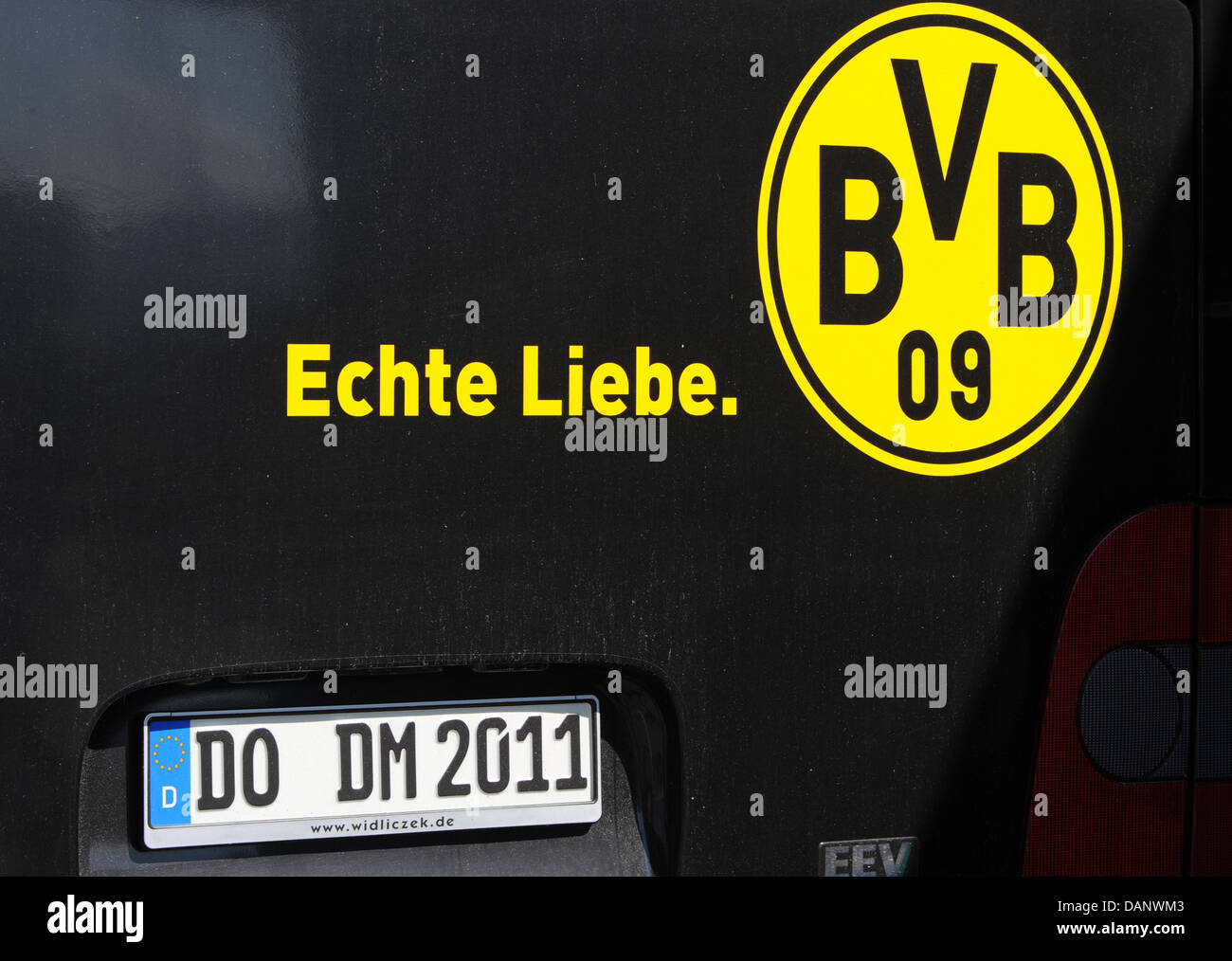 'True love' stands on the back of Borussia Dortmund's team bus at the team's training camp in Bad Ragaz, Switzerland, 11 July 2011. Photo: PATRICK SEEGER Stock Photo