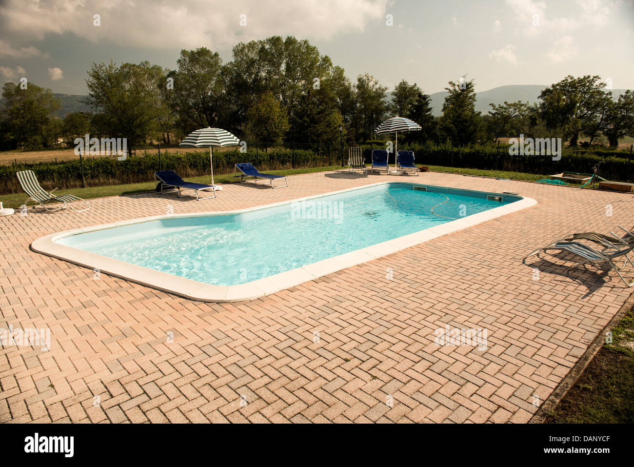 Italy, View of swimming pool Stock Photo