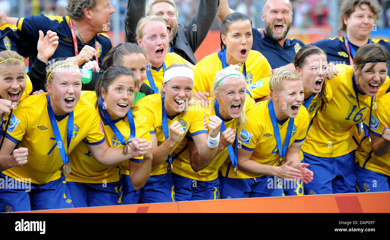Sweden's team celebrates after winning the FIFA Women's World Cup third