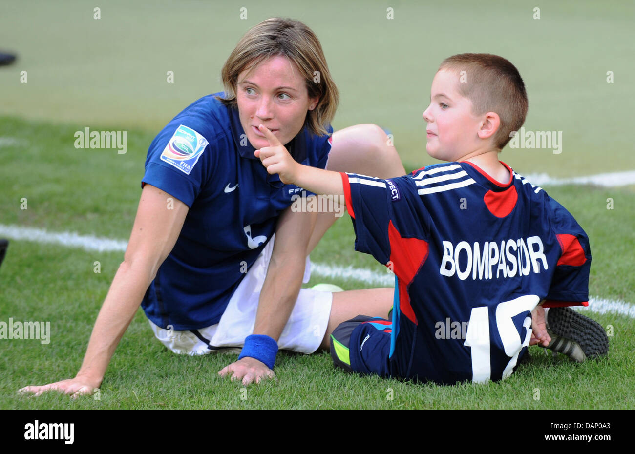 Sonia Bompastor Of France And Her Son Sit On The Pitch After The Fifa Stock Photo Alamy