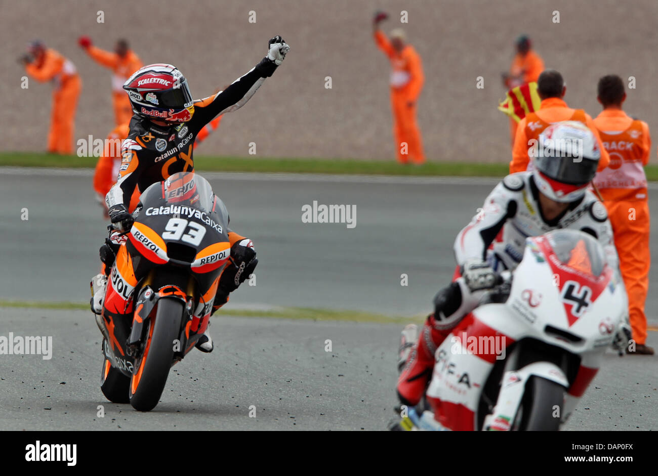 Spanish Suter driver Marc Marquez (L) celebrates his win in the Moto2 ...
