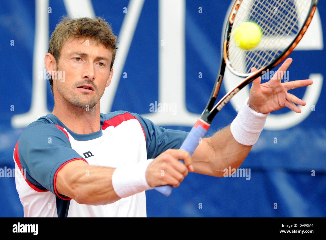 Spansih tennis player Juan Carlos Ferrero plays the ball during the ATP  tournament's final match against Spain's Pablo Andujar at Weissenhof in  Stuttgart, Germany, 17 July 2011. Photo: Bernd Weissbrod Stock Photo - Alamy