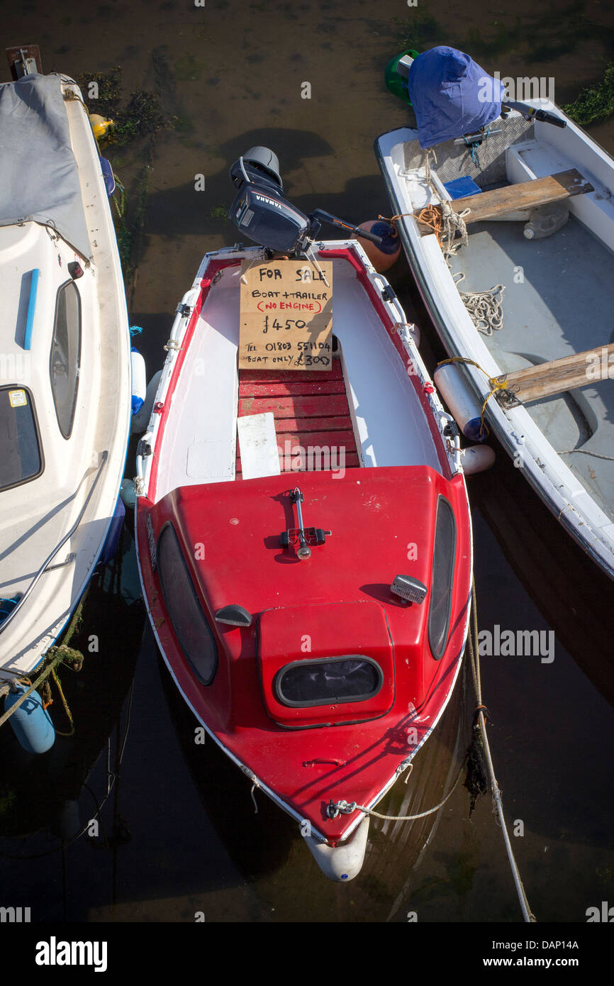 red boat for sale,boat, craft, fishing, for sale, mast, ocean, old, outdoors, rowboat, sailing, saltwater, sea, sign, vessel, wa Stock Photo