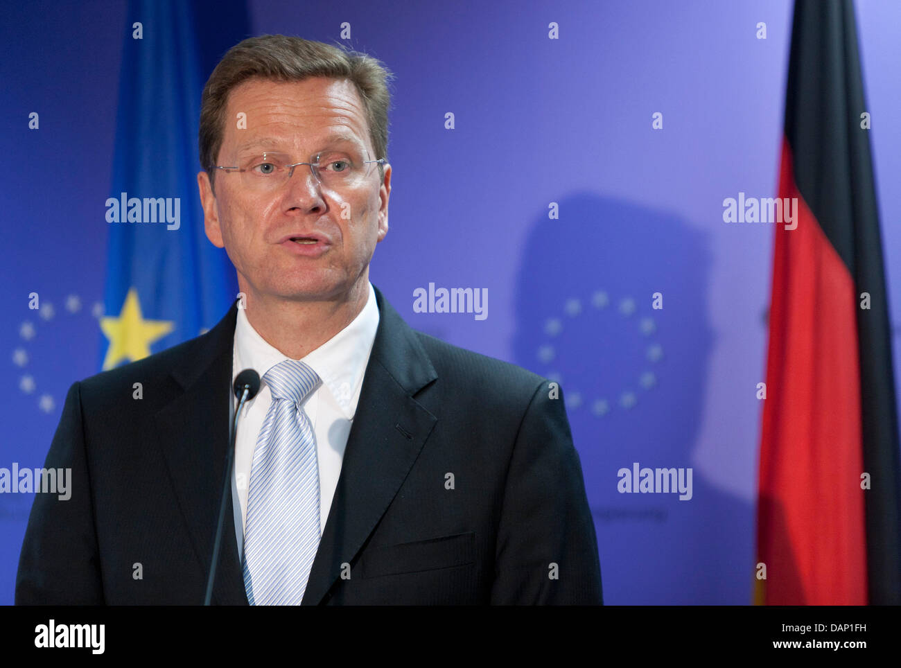 German Foreign Minister Guido Westerwelle talks to the media at the end of a meeting of EU Foreign Ministers at the EU headquarters in Brussels, Belgium, 18 July 2011. Photo: Thierry Monasse Stock Photo