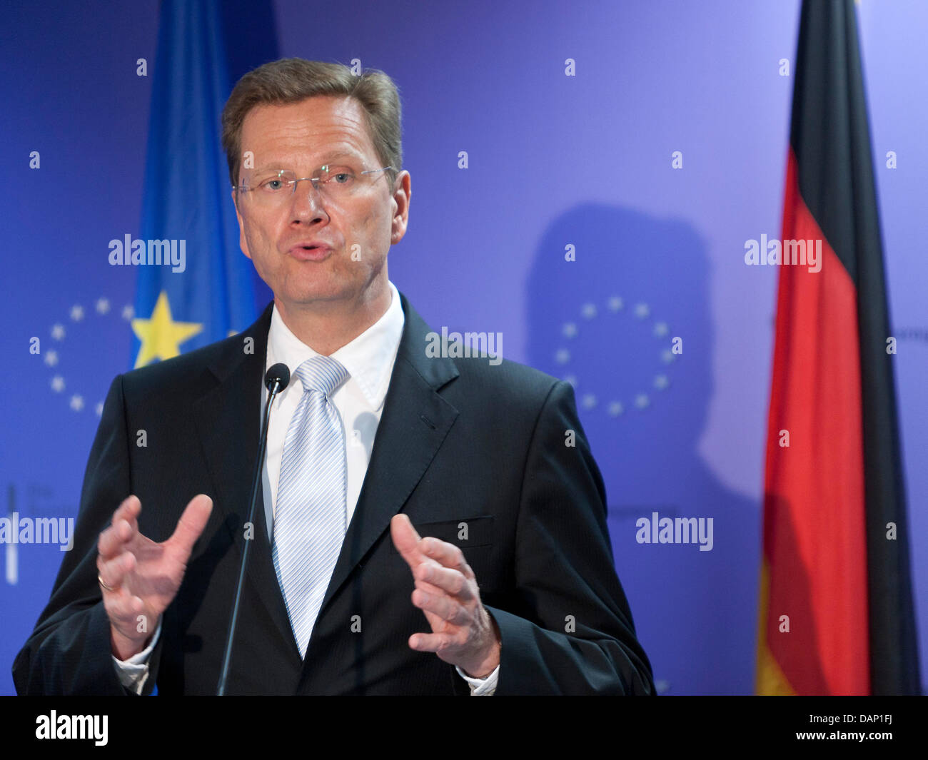 German Foreign Minister Guido Westerwelle speaks to the media at the end of a meeting of EU Foreign Ministers at the EU headquarters in Brussels, Belgium, 18 July 2011. Photo: Thierry Monasse Stock Photo