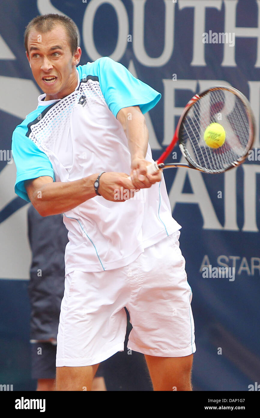 Czech tennis player Lukas Rosol hits the ball during an ATP match against  Italian player Potito Starace at Rothenbaum in Hamburg, Germany, 18 July  2011. Photo: Malte Christians Stock Photo - Alamy