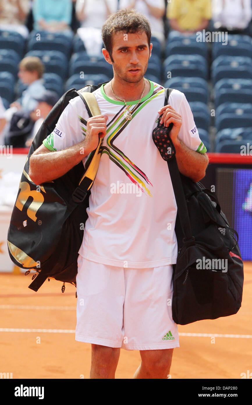 Turkish tennis professional Marsel Ilhan leaves the court afterthe ATP  match against Germany's Forian Mayer at Rothenbaum in Hamburg, Germany, 20  July 2011. Turnaments of the ATP World Tour at Rothenbaum take