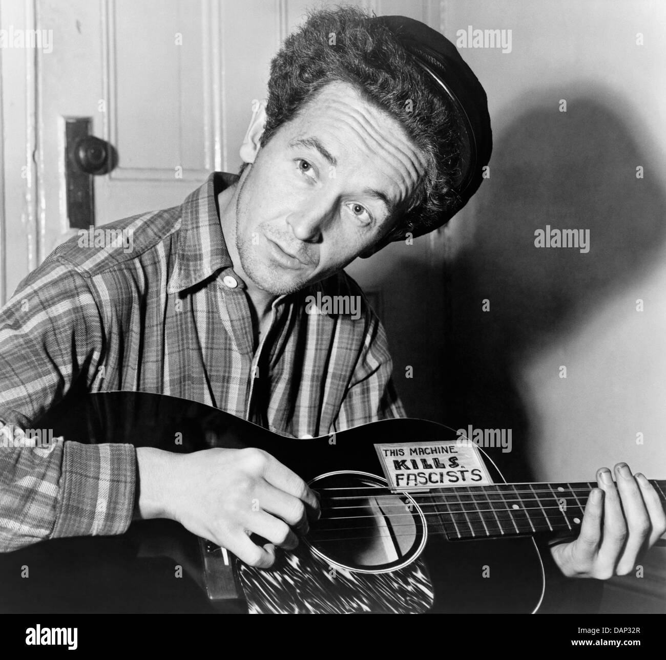 WOODY GUTHRIE (1912-1967) US folk singer in March 1943 Stock Photo
