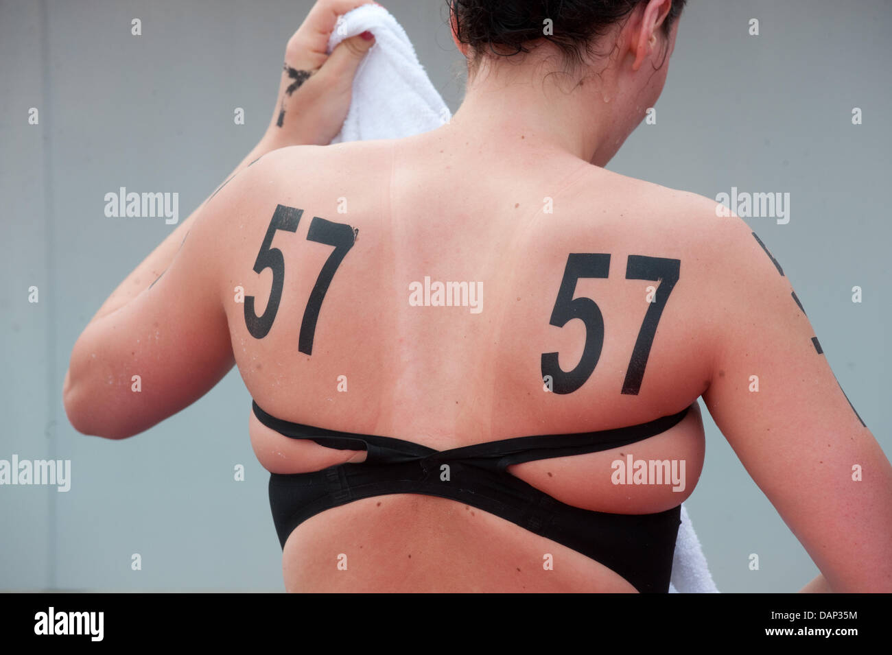 The back of Isabelle Haerle from Germany is pictured after finishing the women's 5km open water event at the 2011 FINA World Swimming Championships, Shanghai, China, 22 July 2011. Photo: BERND THISSEN Stock Photo