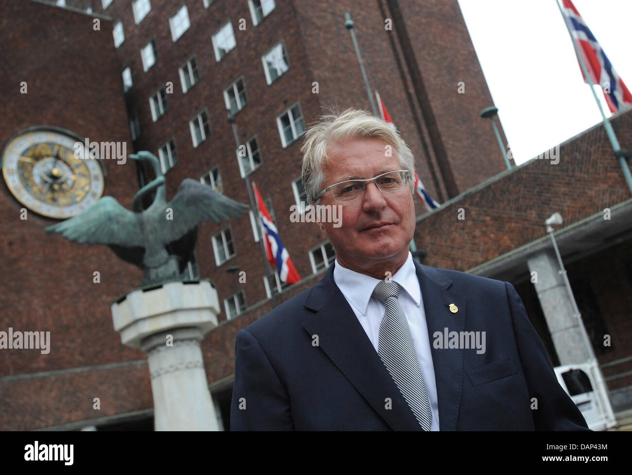 Giving a statement, the mayor of Oslo, Fabian Stang, stands in front of the town hall of Oslo, Norway, 23 July 2011. According to the police at least 91 people were killed by two attacks in Norway. Photo: BRITTA PEDERSEN Stock Photo